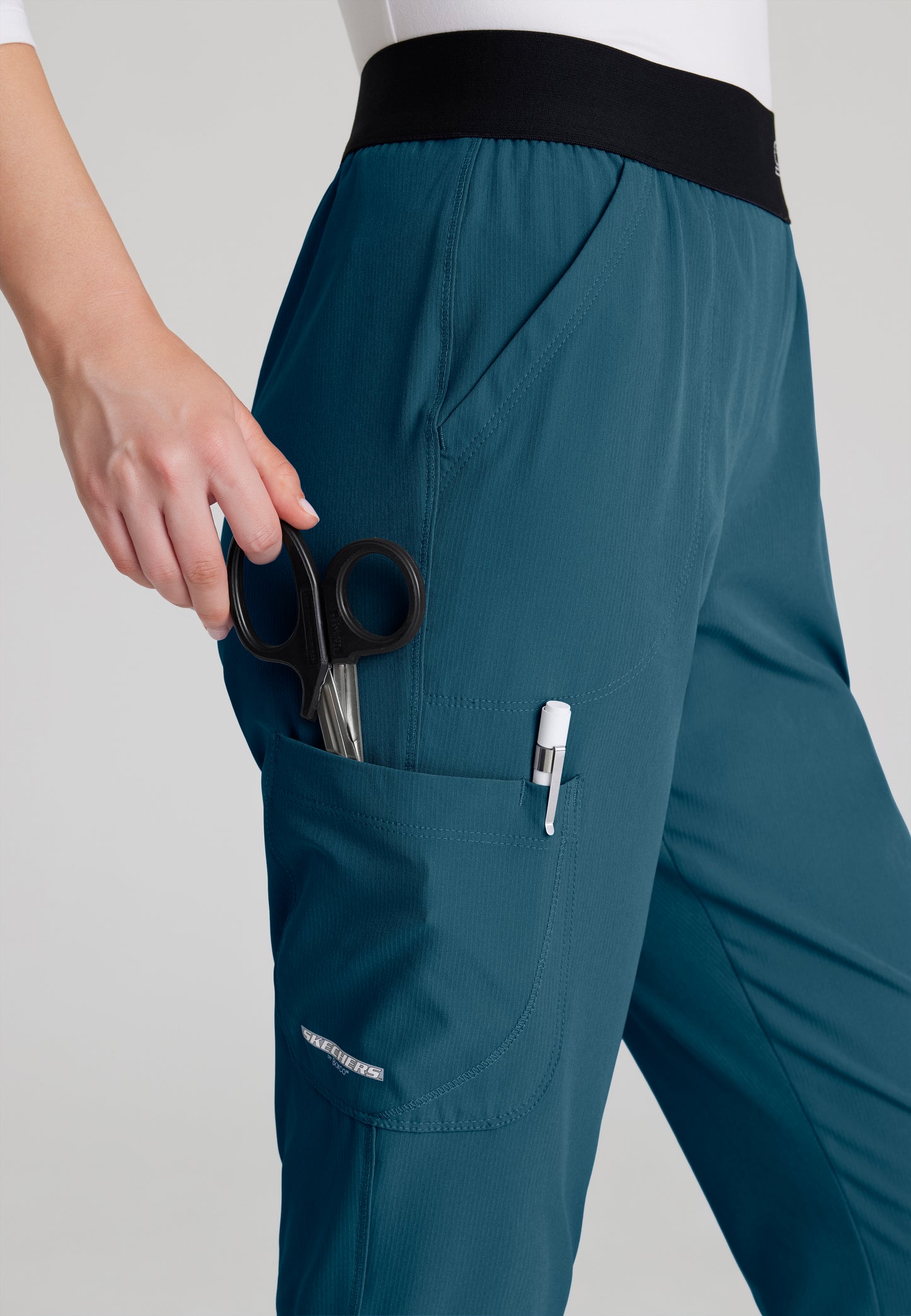 Uniforme Skechers Sk102-Sk202 Reliance